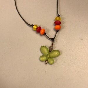 Adjustable butterfly necklace.